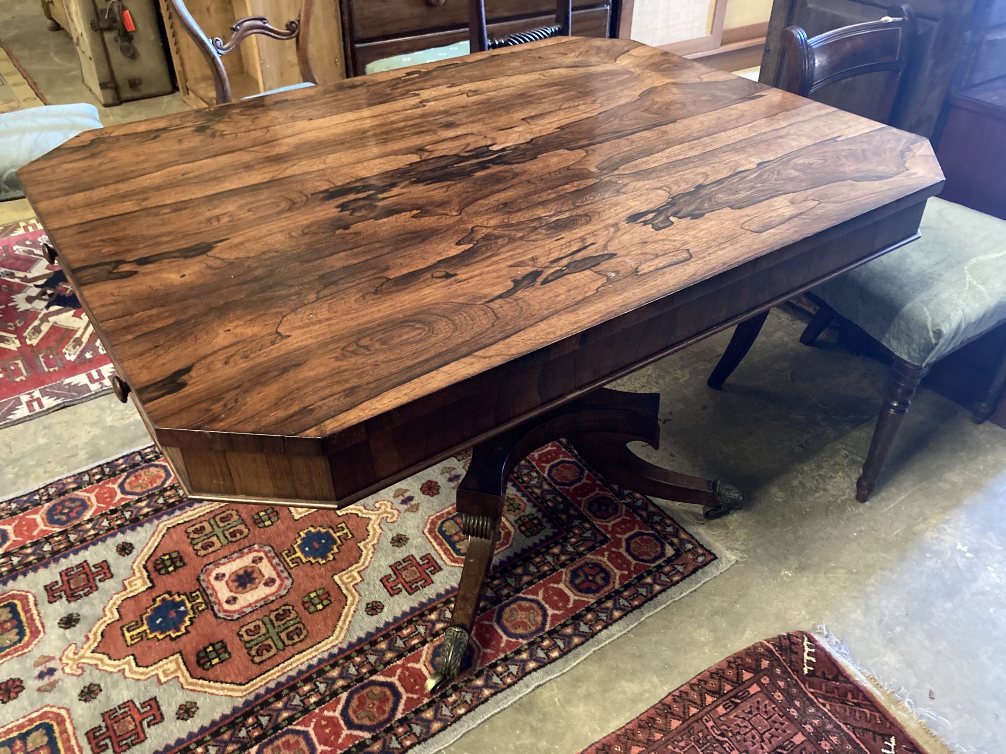 A Regency rosewood centre table fitted drawers on pillar and quadripartite platform base, width 117cm, depth 88cm, height 72cm